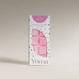 YUMA Pure Powder Wax Melts in pink, in a white box with gold details and an open lid.