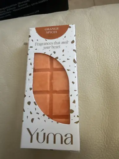 Orange YUMA wax melt in white packaging with the Orange Spices scent.