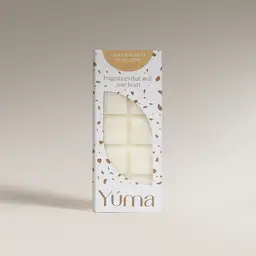 YUMA Caramelized Popcorn Wax Melts in a white box with brown details and wax cubes visible.