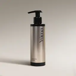 YUMA Tonka Body Milk in a metallic bottle with a black pump, on a neutral background.