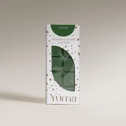 YUMA Fig Sap green wax melts in white packaging with a leaf-shaped opening.