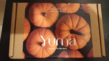 YUMA paper box with an image of orange pumpkins and the label Pumpkin Pie Wax Melts.