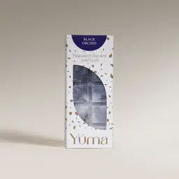 YUMA Black Orchid Wax Melts packaging with grey wax cubes on a white background.