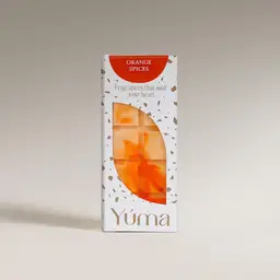 YUMA Orange Spices wax melts in paper packaging with orange tones on a white background.