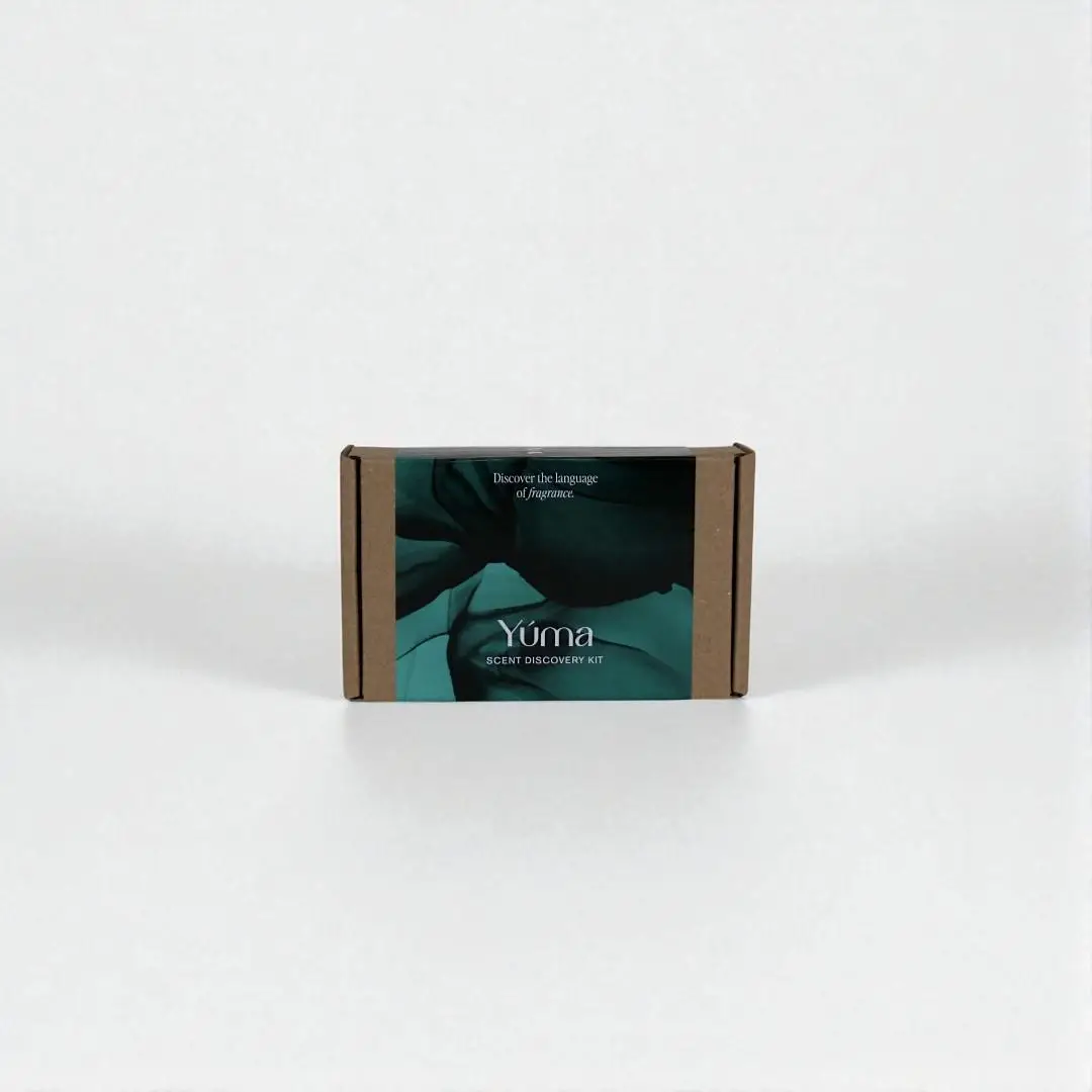 Closed YUMA Sample Kit paper box with a dark green label on a white background.