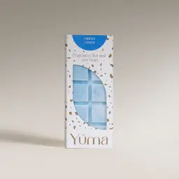 YUMA Fresh Linen Wax Melts in a white box with light blue wax cubes.
