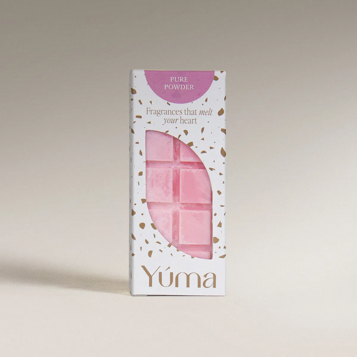 YUMA Pure Powder Wax Melts in pink, in a white box with gold details and an open lid.