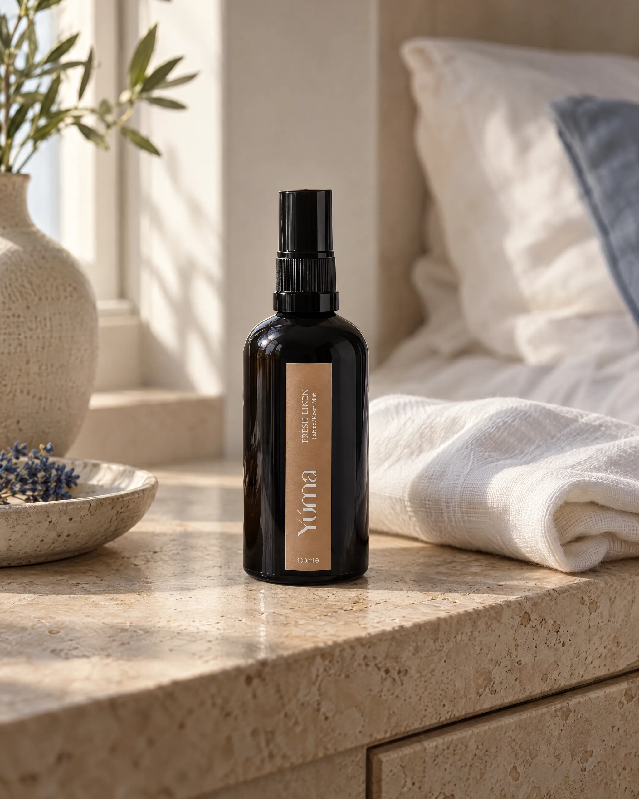 Yúma Fresh Linen Fabric/Room Mist in a home setting.