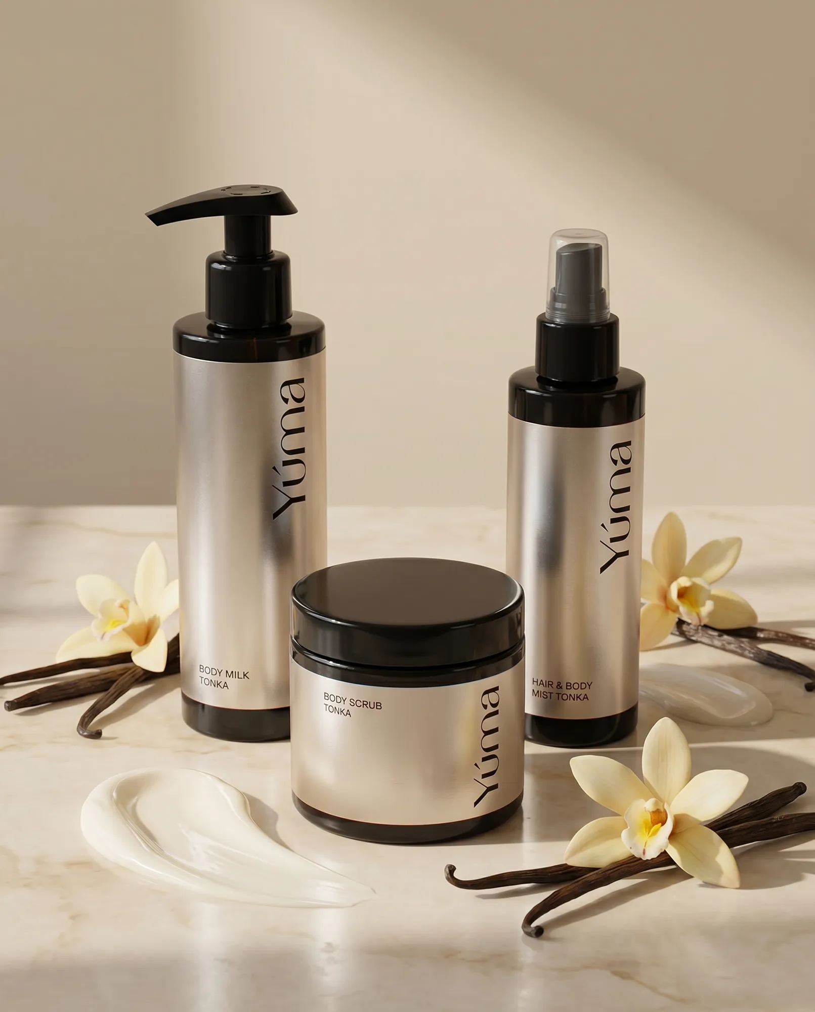 YUMA Tonka body care set including body milk, scrub, and mist, surrounded by flowers and vanilla pods.