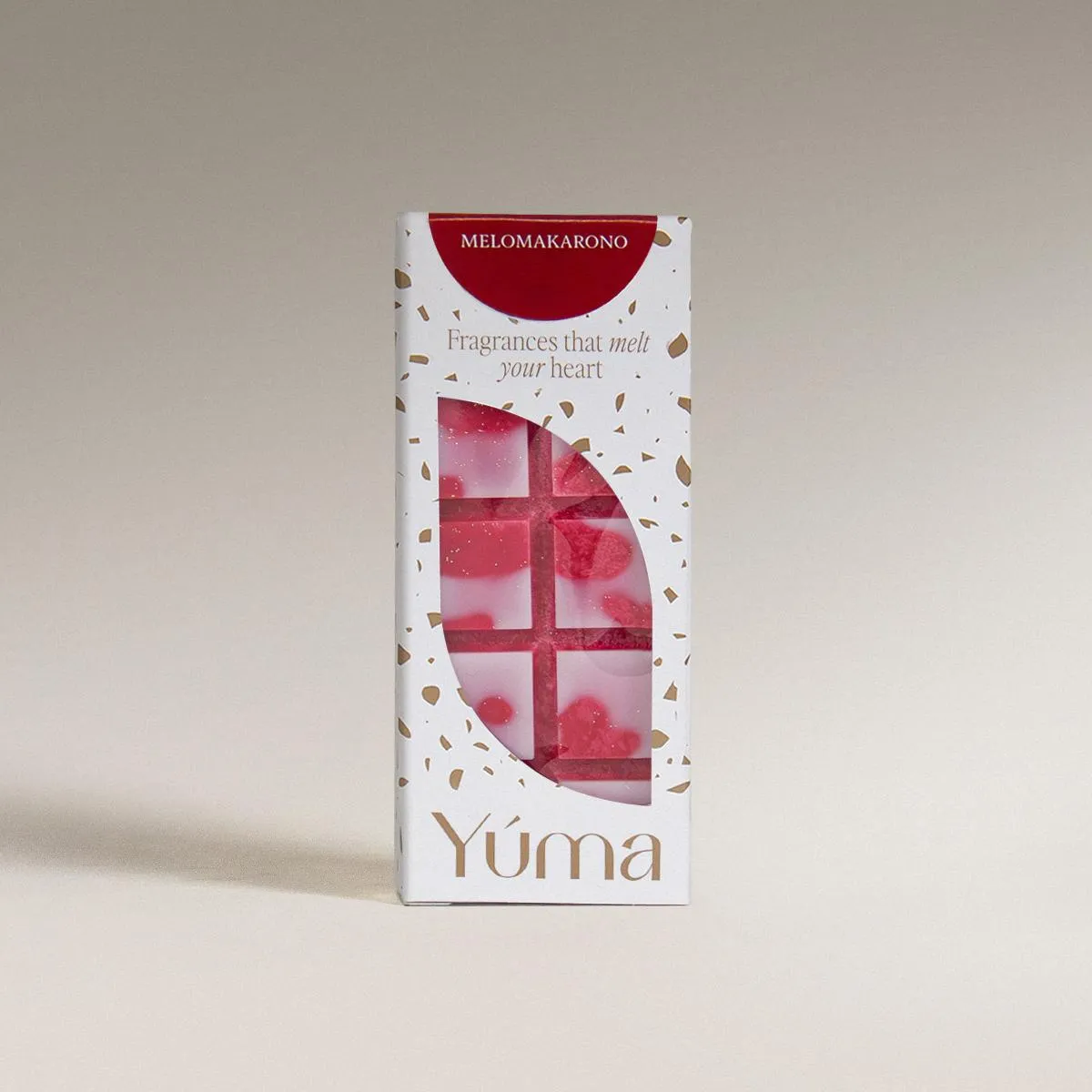 White YUMA Melomakarono wax melts packaging with red and pink chocolate-shaped scented wax pieces.