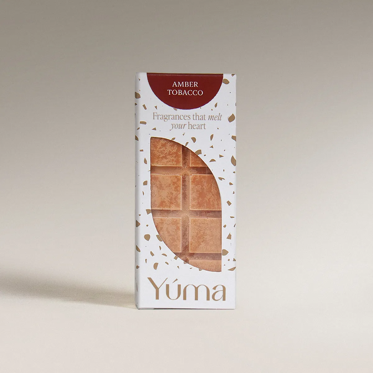 YUMA Amber Tobacco Wax Melts packaging with the embossed wax bar visible.