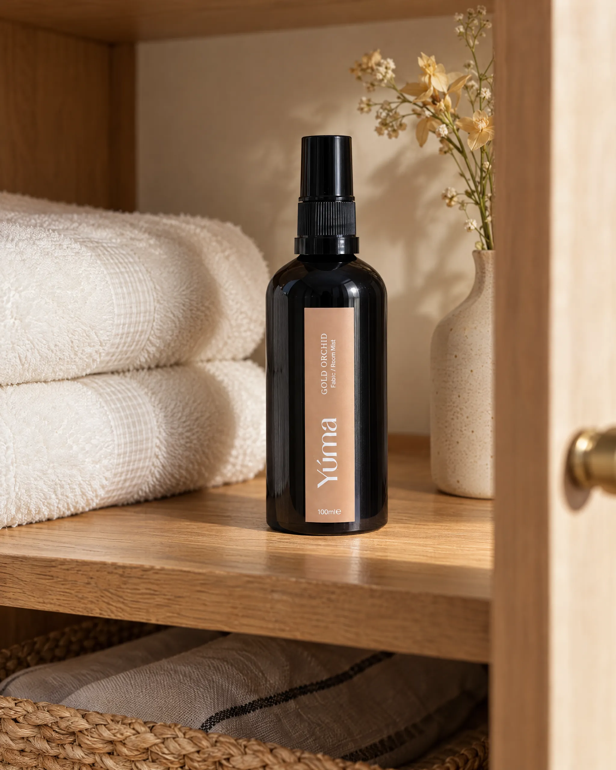 Yúma Gold Orchid Fabric/Room Mist in a home setting.