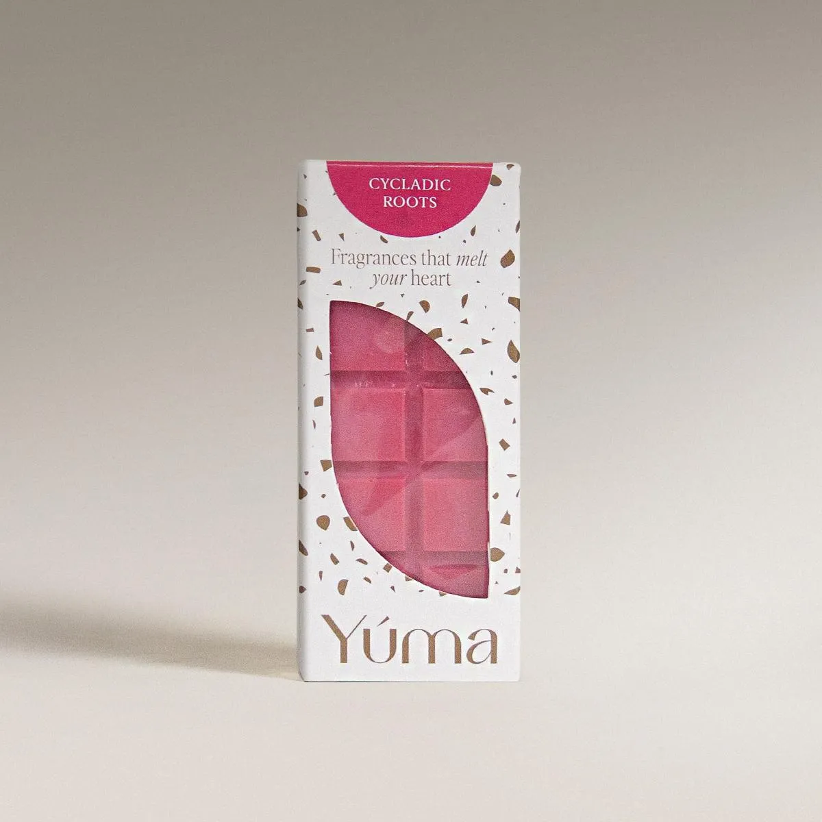 YUMA Cycladic Roots pink wax melts in white packaging with brown details and an open window.