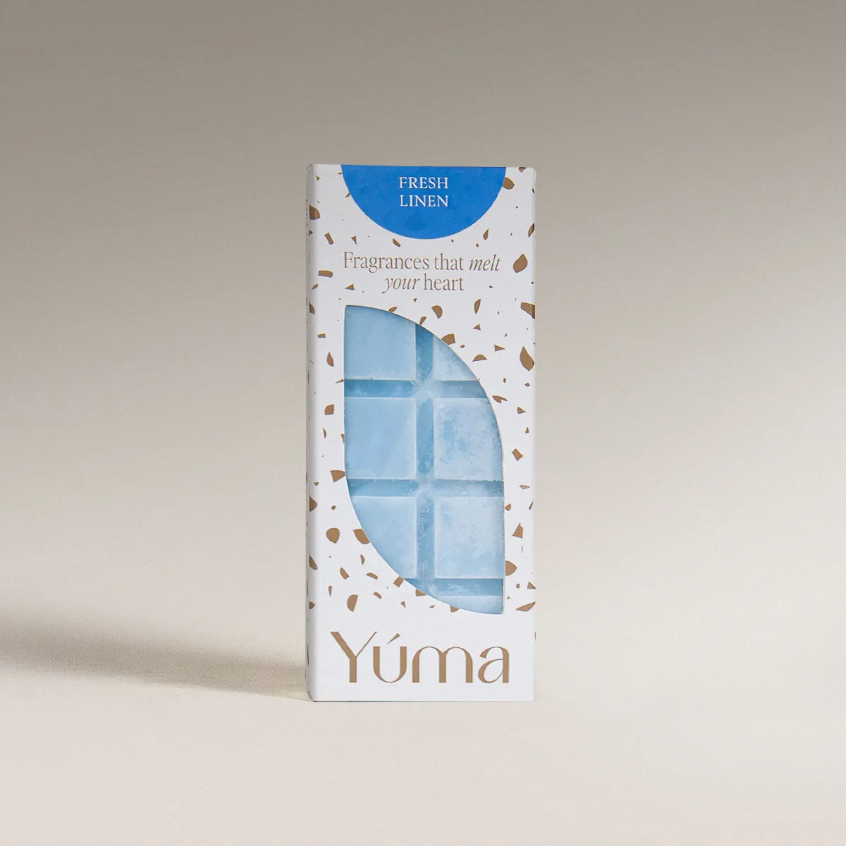 YUMA Fresh Linen Wax Melts in a white box with light blue wax cubes.