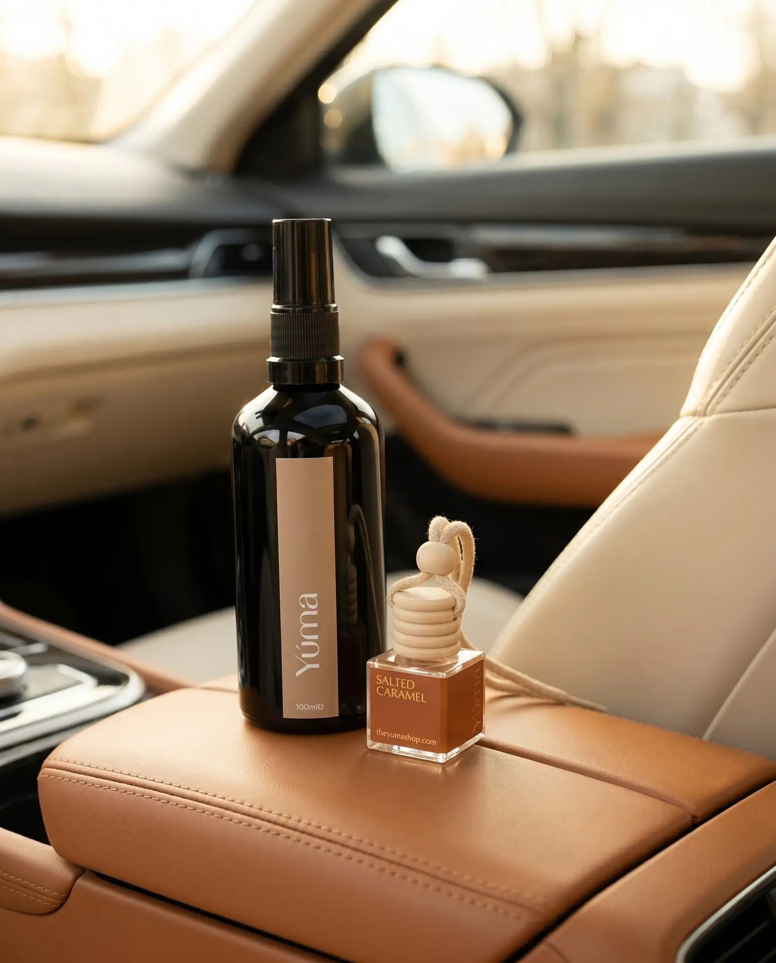 Close-up of a cabin air vent and stitched leather upholstery in a car. Close-up of a cabin air vent and stitched leather upholstery in a car.
