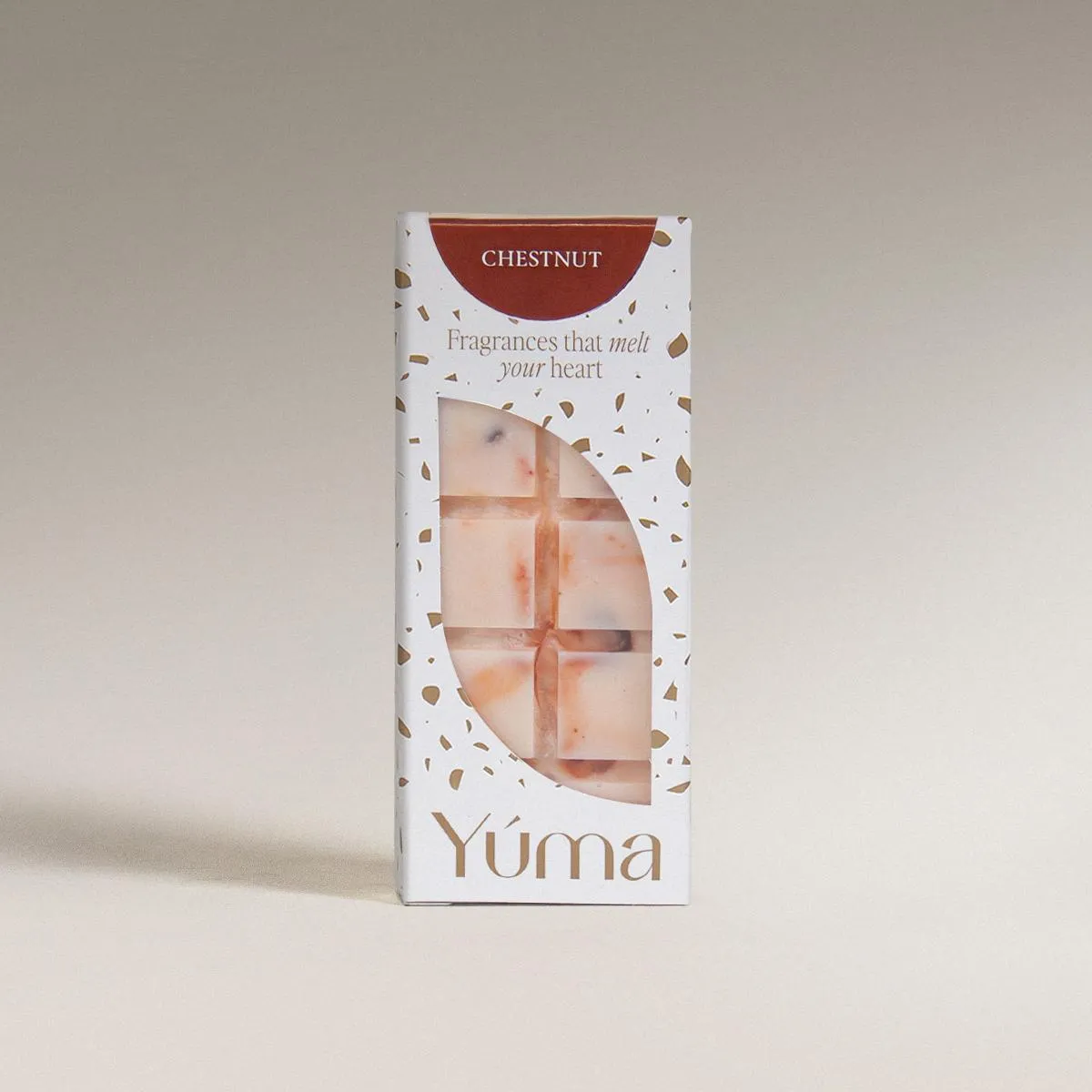 Chestnut Snap Bar YUMA Chestnut wax melts in white packaging with an opening that reveals the embossed wax bar.