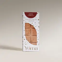 Amber Tobacco Snap Bar YUMA Amber Tobacco Wax Melts packaging with the embossed wax bar visible.